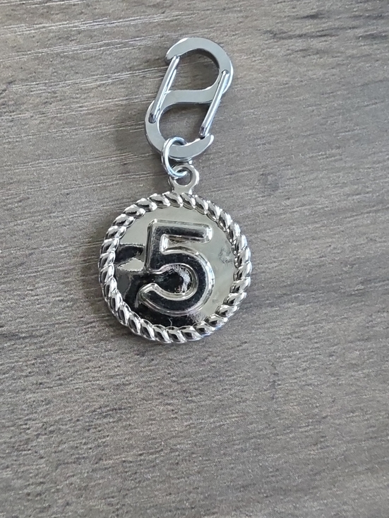 Jewelry - Chanel Silver Number 5 Charm Pendant
